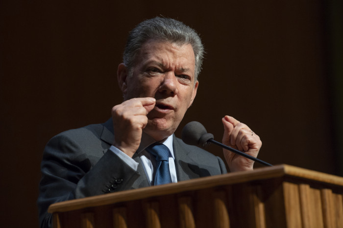 Closeup of Juan Manuel Santos behind a lectern during an Ubben Lecture