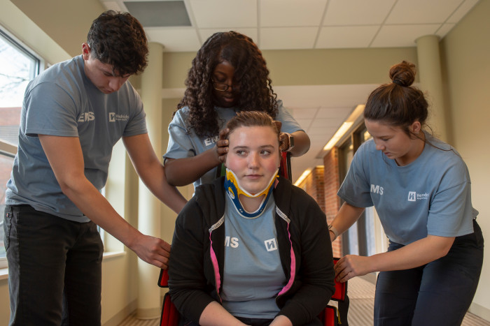 Students working on EMT training