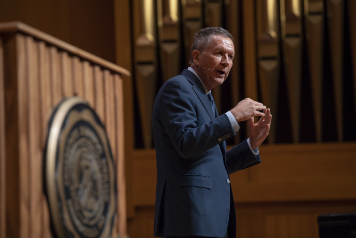 Closeup of John Kasich next to a lectern during an Ubben Lecture