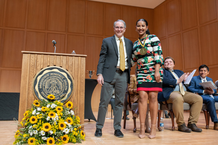 Amerti Guta with Dave Berque at an awards ceremony