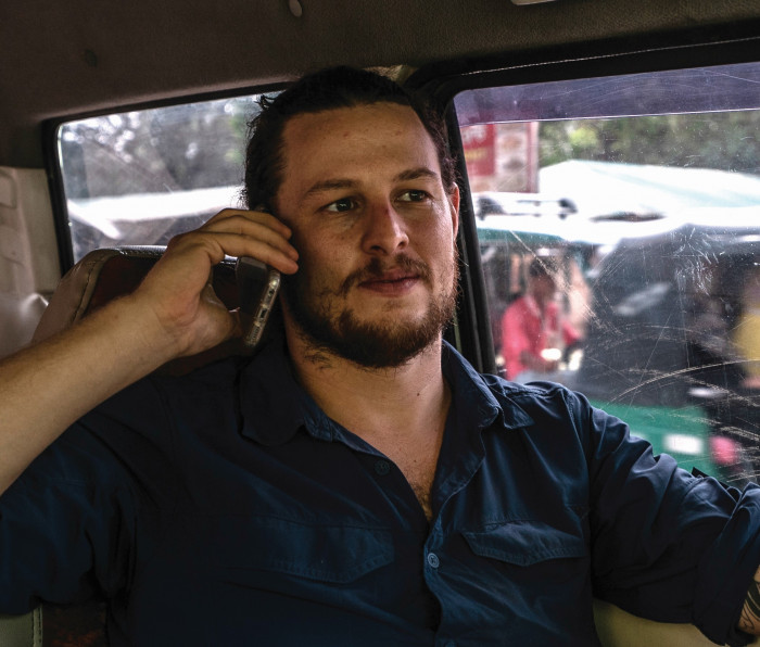 Ben Solomon on phone in 2018 photo