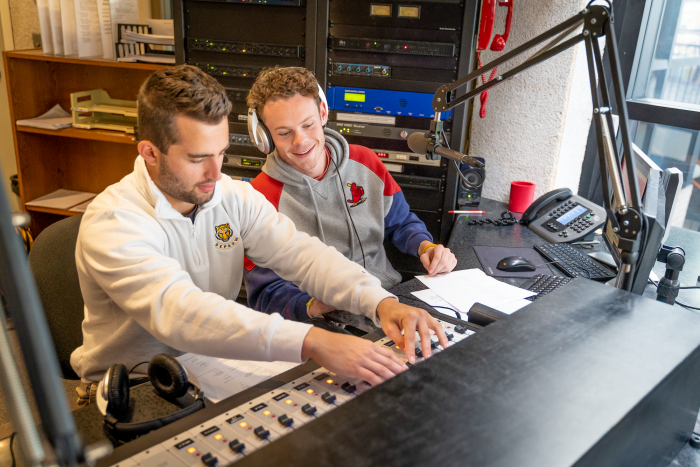 Students in the WGRE-FM radio booth