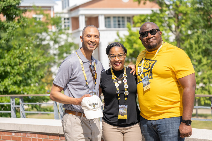 Family smiling and posing in front of Percy Julian