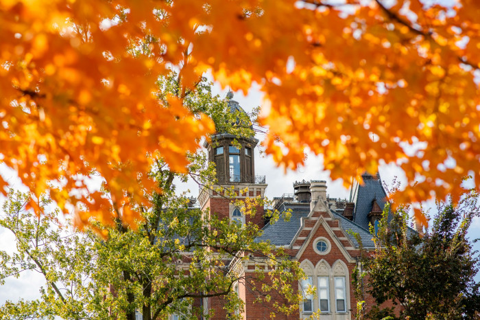 East College with autumn leaves