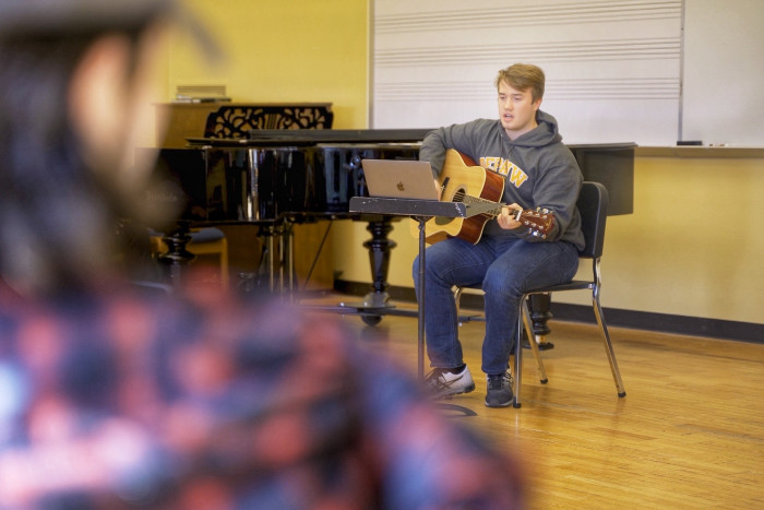 Abel Bates '22 workshops his song in class.