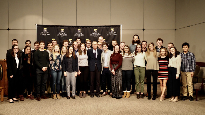 John Kasich posing with a group of students