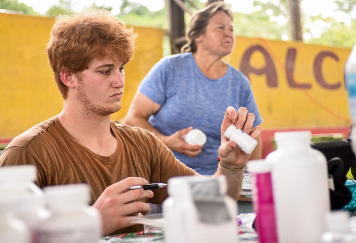 Jack Raffo '22 prepares meds 