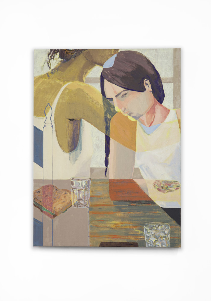 Two figures with a sandwich and two glasses on a table