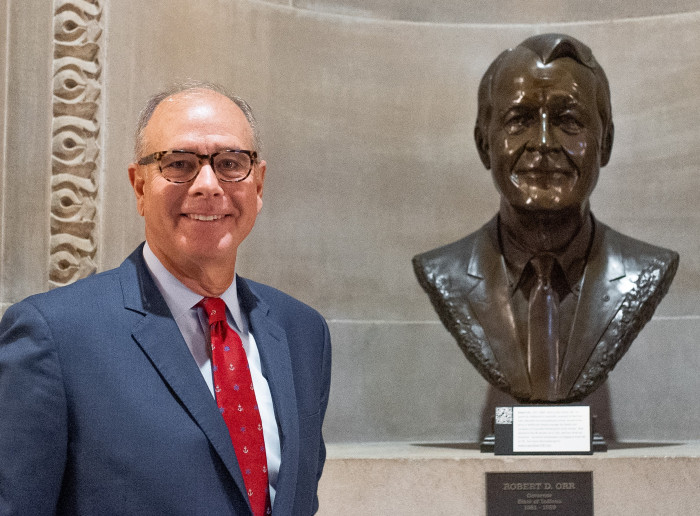 John Hammond with a bust of late Gov. Robert D. Orr