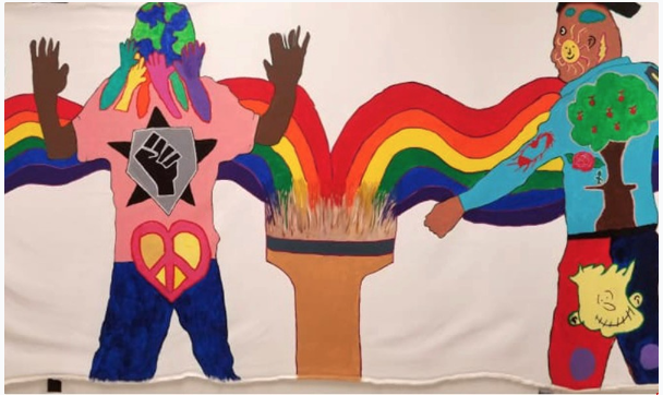 Two colorful figures with many designs on them including hands, trees, "piece symbol" in the shape of a heart etc. With a torch sending out a colorful rainbow towards each figure.
