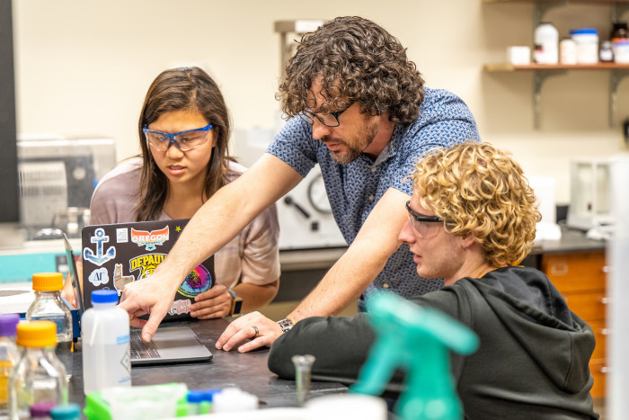 Dad Gurnon directs students in the research lab