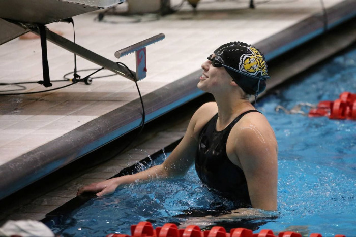 female in swimming lap pool