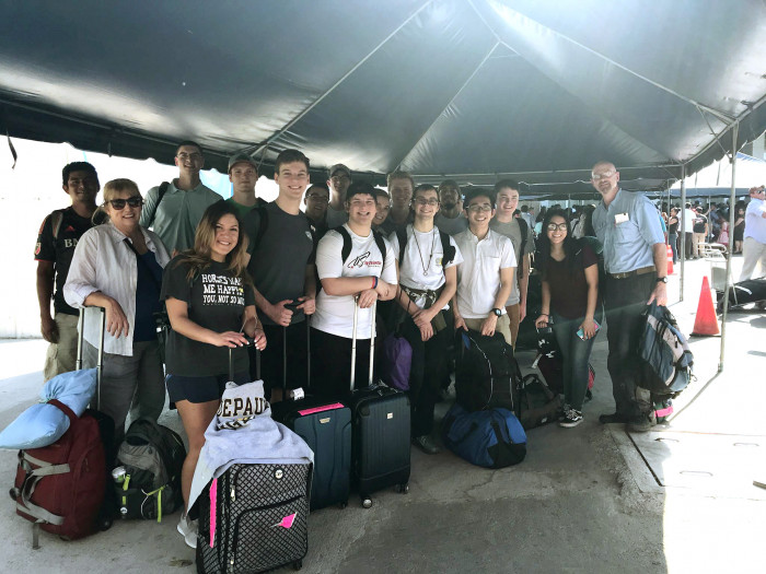 Students at the airport in El Savador