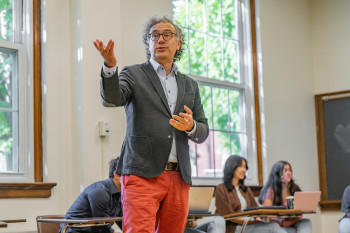 Professor David Alvarez teaches students in a classroom