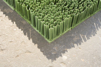 Monoculture by Dawn Holder depicts a detail image of green fake grass