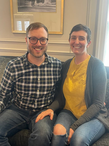 andy and jackie sitting on couch