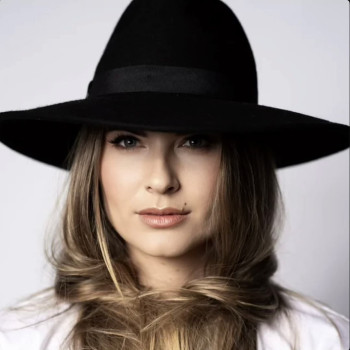 woman in black hat