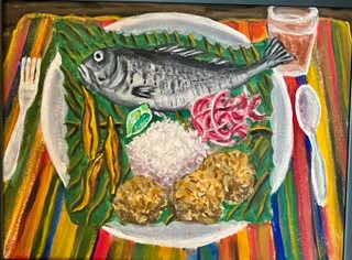 Fish, rice, leaf and other food on plate with fork and spoon on either side and a glass with liquid