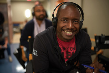 Marqui Jackson '00 with headgear on TV set