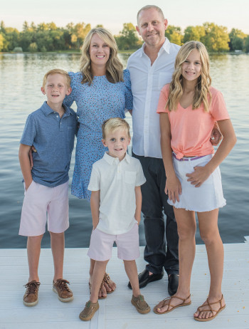 Jeff Smith and family with water backdrop