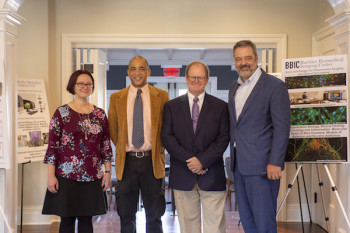 Biology professors and principal investigators of the Buehler Biomedical Imaging Center Melissa Petreaca and Pascal Lafontant with Buehler Family Foundation President A.C. Buehler ’78 and Dr. Mark McCoy