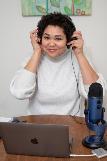 Lauren Clark adjusts headphones 