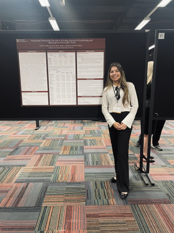 Student standing next to Functional Personality Disorders: Relating Executive Functioning and Maladaptive Personality Traits