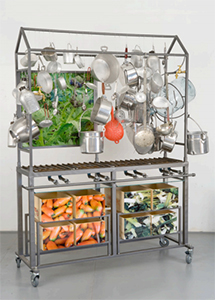 Mexican Kitchen, 1997-2008, recycled Mexican gas cooker, steel structure, mirrors, 8 recycled fruit crates, 8 laminated Lambda photographs, various utensils, taps, 4 wheels, 78 3⁄4 x 71 x 23 1⁄2 in. Photography: Bertrand Huet