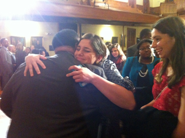 Martin Luther King III hugging a student