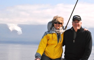 Rick and Jan Neville with ocean background