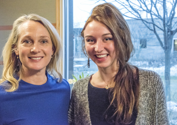 Piper Kerman posing with a student