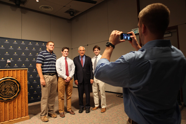 Ron Paul posing for photos with students following the Ubben Lecture