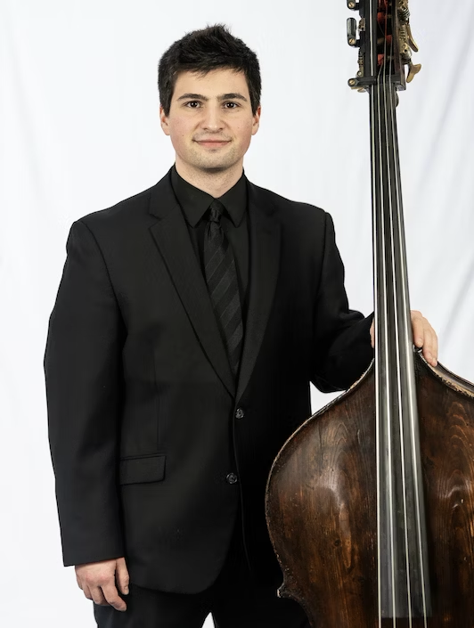 Smiling man with double bass