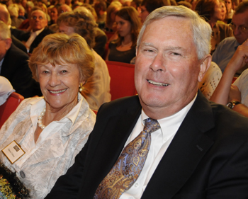 Tim and Sharon Ubben sitting in the crowd at the Carl Rove and Howard Dean debate