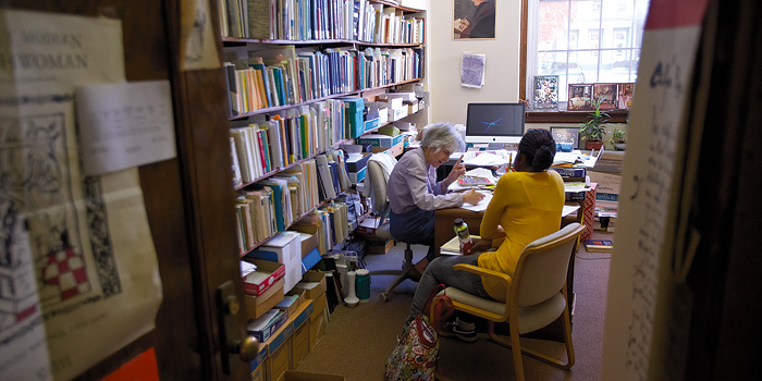 Andrea Sununu working with a student in her office