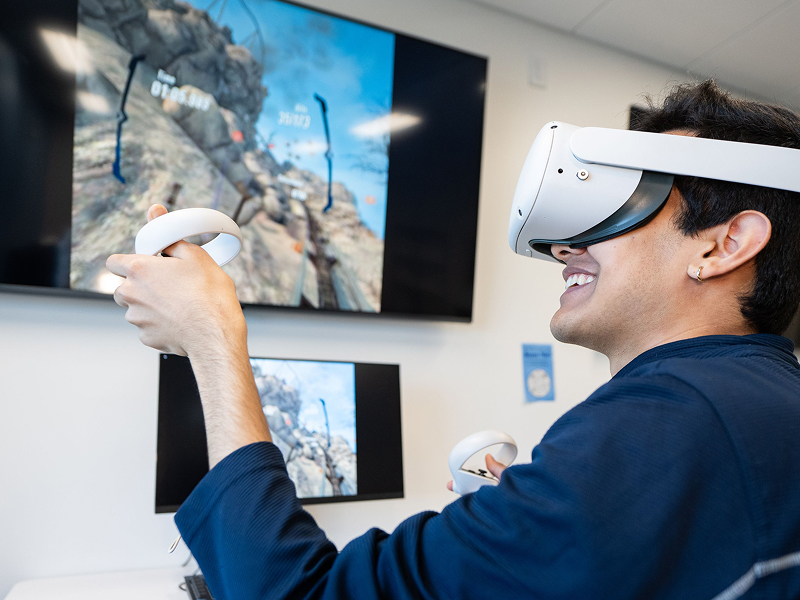 student with 3d glasses on