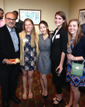 Yeonmi Park posing with students and faculty at the Inn