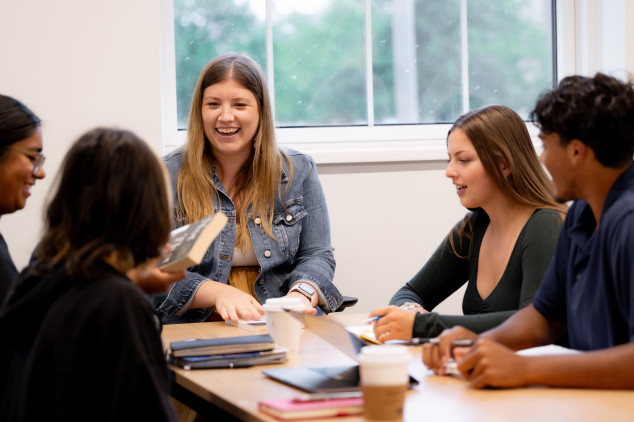 students meeting with a mentor in SBL