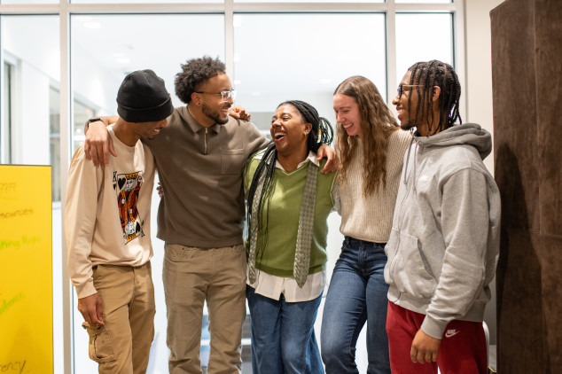 Students smiling together at the CDI