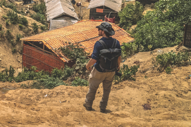 Ben Solomon shooting photos on a news story