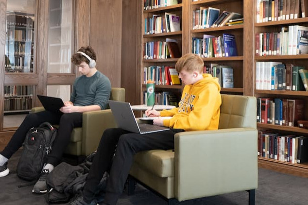 two males in library