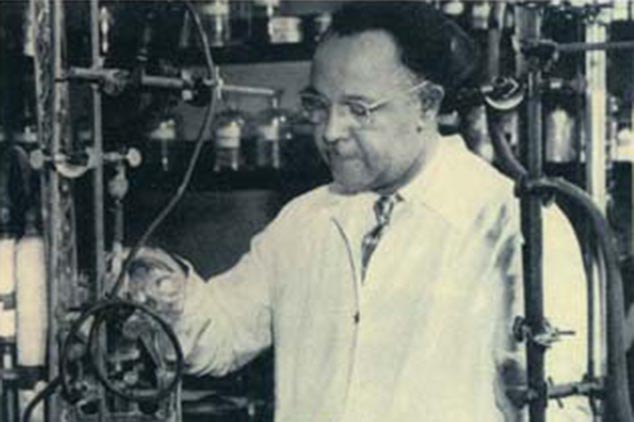 Percy Julian conducting an experiment in the lab