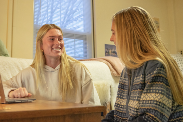 2 female students talking