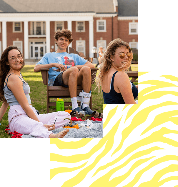 Students seated on the quad