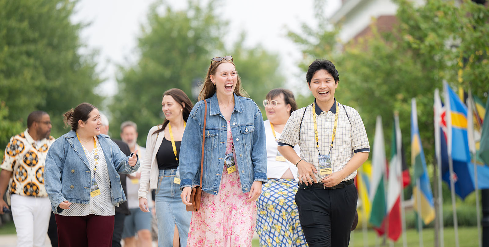 alumni walking through campus