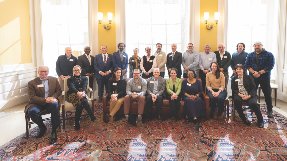 A few of the three school advisers meet at Hoover Hall