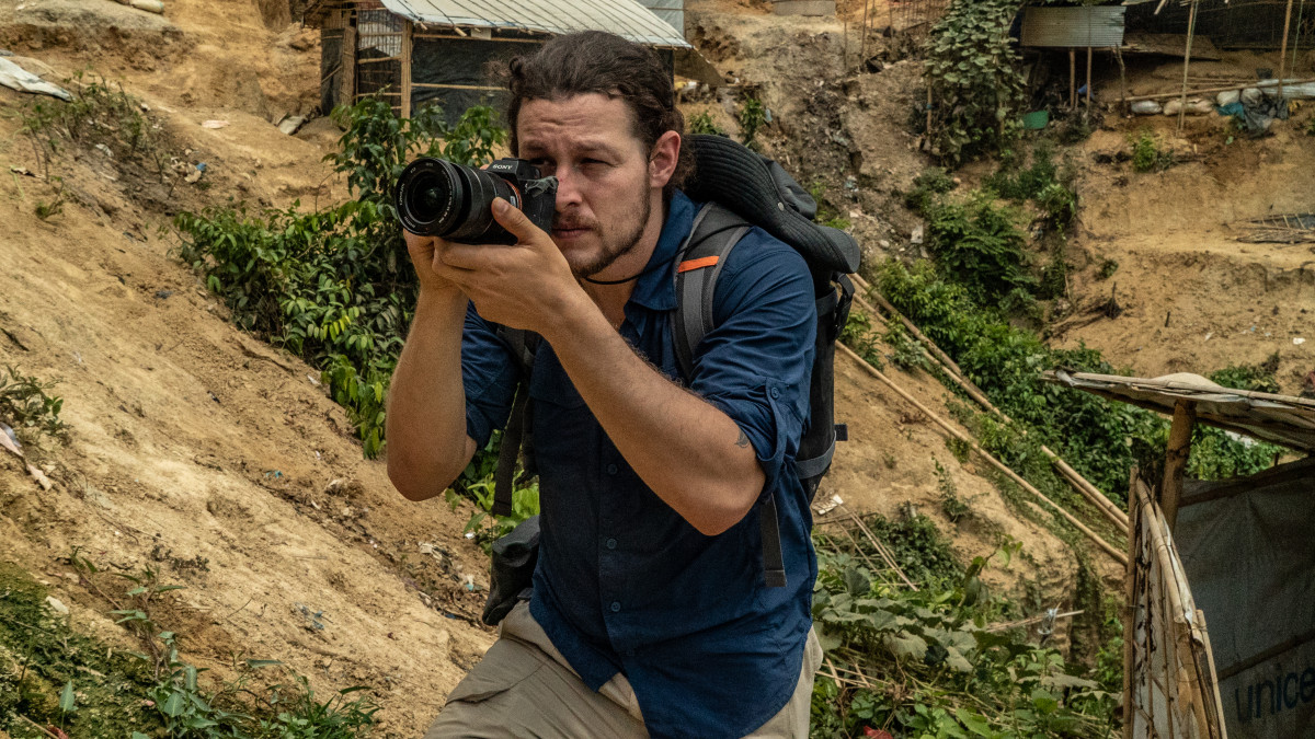 Ben Solomon '10 with camera in Rohingya