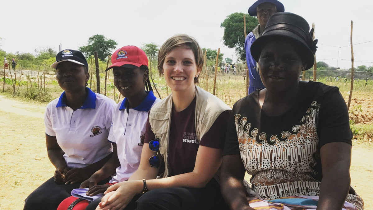 Ashley Baxstrom ’07 with residents of Zimbabwe