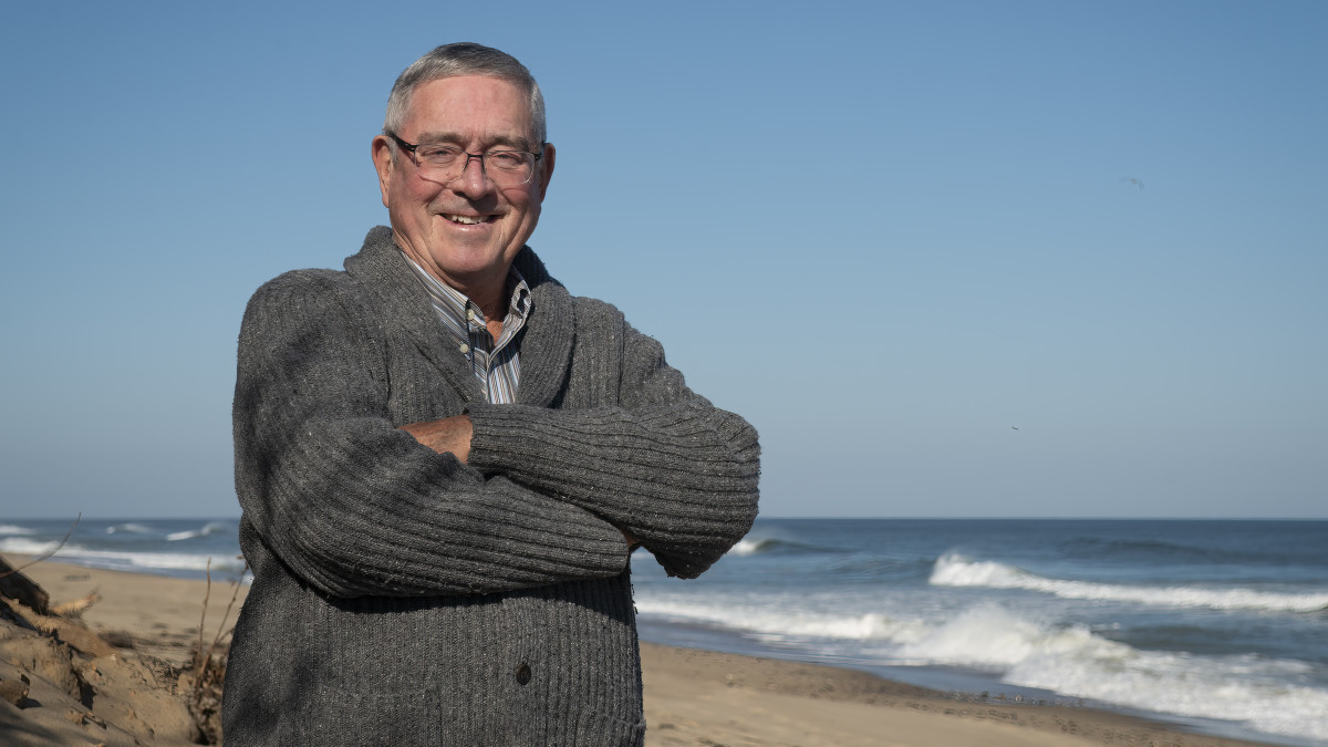 Michael Snell stands on the beach on Cape Cod