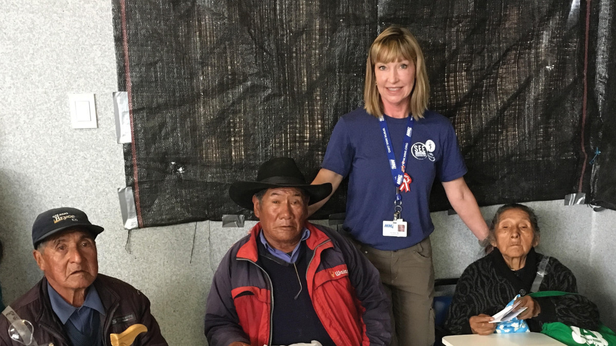 Kimberly Bass ’83 with patients in Peru